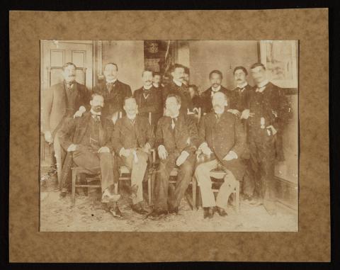 Group of men in suits posing for a photo in Washington.
