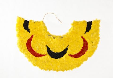Half-circle collar. Collar is bright yellow with black and red crescents.