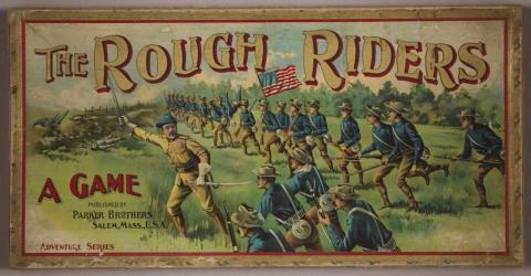 Rough Riders board game front cover featuring Teddy Roosevelt leading a charge of the Rough Riders.