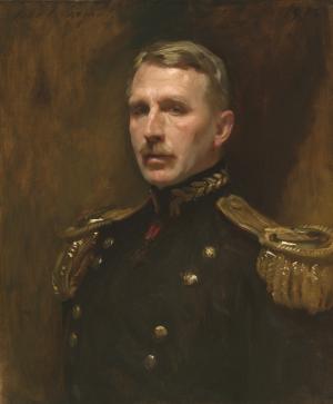Bust length portrait of a man in military uniform.  He faces ¾ left, has light brown hair and a moustache
