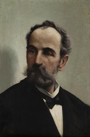 Bust length portrait of a bearded man in a black suit.