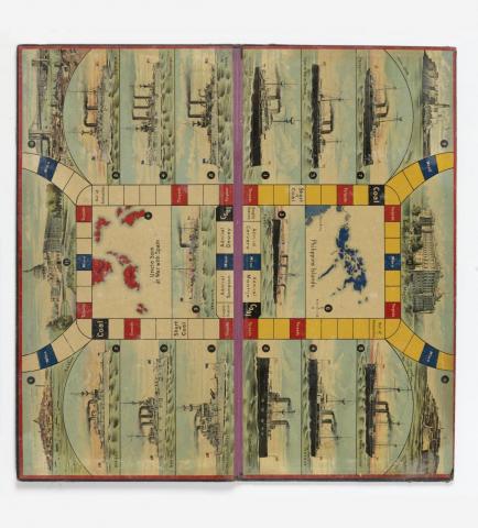 Colorful board game featuring pictures of battleships and maps.